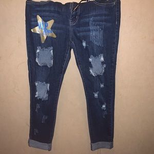 Never worn dark washed distressed jeans